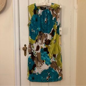 Chic but comfortable knit “sheath” style dress featuring abstract floral print